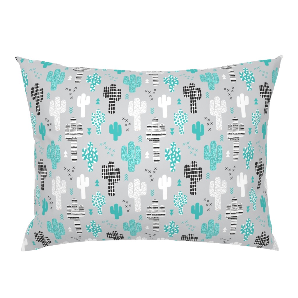 Cool western geometric cactus garden with triangles and arrows gender neutral pastel blue black and white