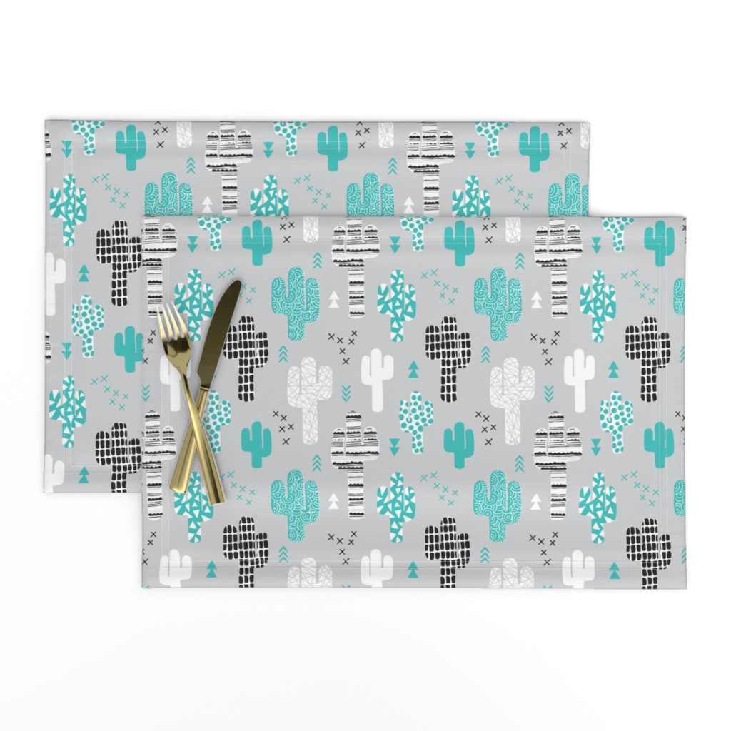 Cool western geometric cactus garden with triangles and arrows gender neutral pastel blue black and white