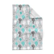 Cool western geometric cactus garden with triangles and arrows gender neutral pastel blue black and white