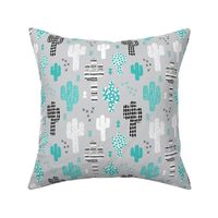 Cool western geometric cactus garden with triangles and arrows gender neutral pastel blue black and white