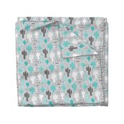 Cool western geometric cactus garden with triangles and arrows gender neutral pastel blue black and white