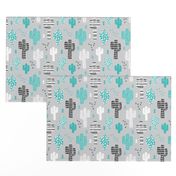 Cool western geometric cactus garden with triangles and arrows gender neutral pastel blue black and white