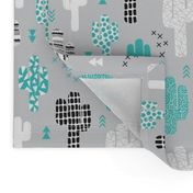 Cool western geometric cactus garden with triangles and arrows gender neutral pastel blue black and white