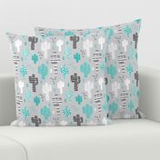 Cool western geometric cactus garden with triangles and arrows gender neutral pastel blue black and white