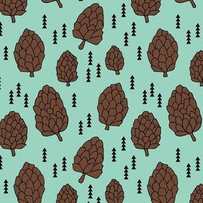 Pine cones winter and fall forest theme in gender neutral mint