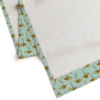 gold glitter flamingos - mint