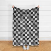 Cheater Quilt // black and white quilt minimal modern geometric baby nursery