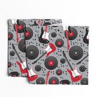 guitars and records on gray