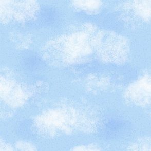 Cute puffy small white clouds on a sunny aqua blue sky Water