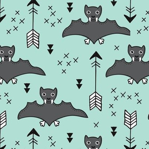 Cool bats flying dogs illustration design with geometric triangles and arrows for halloween and cool fashion in mint