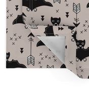 Cool bats flying dogs illustration design with geometric triangles and arrows for halloween and cool fashion gender neutral beige