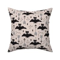 Cool bats flying dogs illustration design with geometric triangles and arrows for halloween and cool fashion gender neutral beige