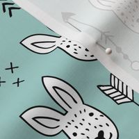 Cool white bunny and geometric arrows spring easter design in gender neutral soft blue