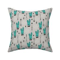 Cool hipster white bunny and geometric arrows spring easter design in gender neutral pastel blue