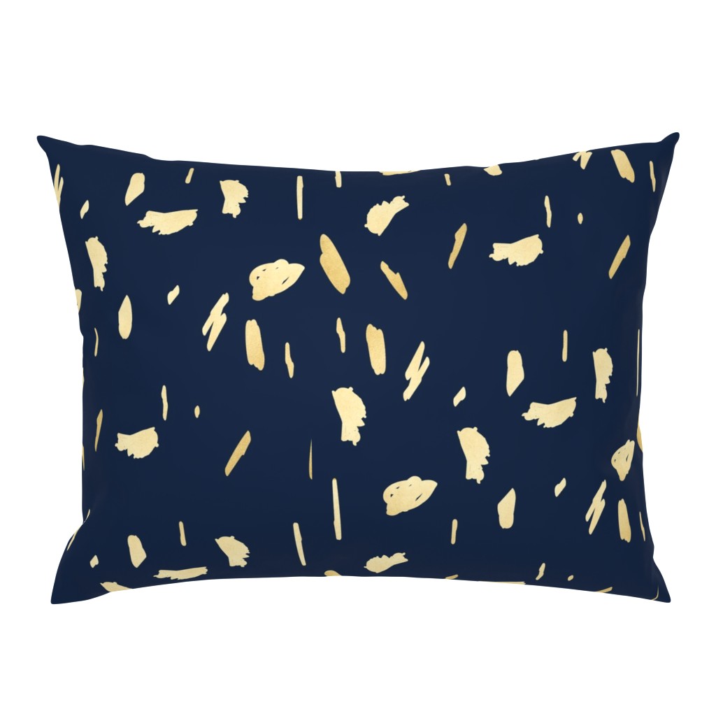 Gold paint blobs on navy blue