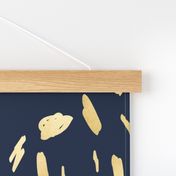 Gold paint blobs on navy blue