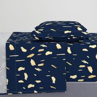 Gold paint blobs on navy blue