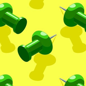 push pins in green on yellow