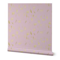 Gold paint blobs daubs on light pale pink