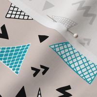 Cool abstract memphis style geometric triangle and arrow shapes gender neutral beige blue