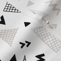 Cool abstract memphis style geometric triangle and arrow shapes gender neutral beige black and white