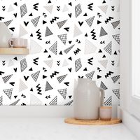 Cool abstract memphis style geometric triangle and arrow shapes gender neutral beige black and white