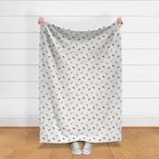 Tiny trotting Australian Shepherds and paw prints - white