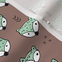 Cool gender neutral fall foxes scandinavian style woodland fabric with geometric details mint