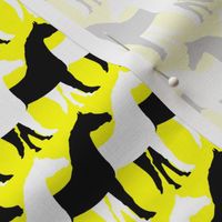 Two Inch Black and White Overlapping Horses on Yellow