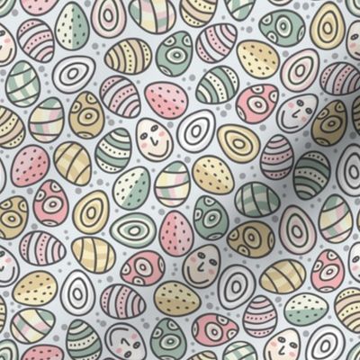 Easter eggs with doodle faces