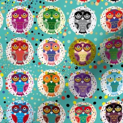 funny colored owls on a turquoise background