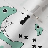Cute kids dolphin design scandinavian style drawing with geometric crosses and water waves mint