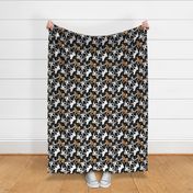 Trotting Akitas and paw prints - black