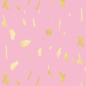 Gold paint splatter blob daubs on pink