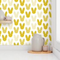 Abstract scandinavian style summer spring bunny ears in gender neutral mustard yellow