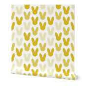 Abstract scandinavian style summer spring bunny ears in gender neutral mustard yellow