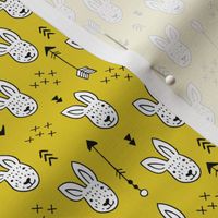 Cool white bunny and geometric arrows spring easter design in gender neutral mustard yellow XS