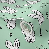 Cool white bunny and geometric arrows spring easter design in gender neutral mint green XS