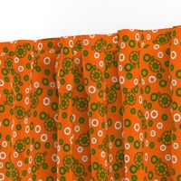 Green and White Gears on Orange