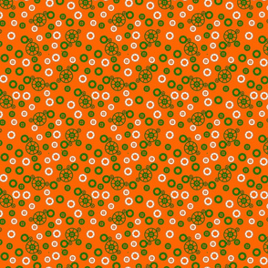 Green and White Gears on Orange