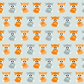 Baby foxes in orange and teal