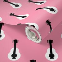 Cool retro scandinavian style guitar music instrument pink black and white