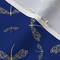 Lacy Golden Dragonflies on Blue