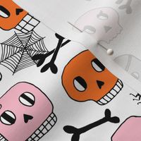 skulls // pink orange halloween spider bones spider webs 