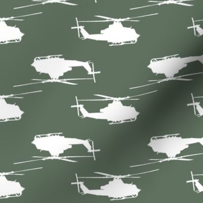 Huey helicopters in white with green background