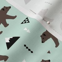 Grizzly bear woodland and geometric triangle mountains fall winter mint