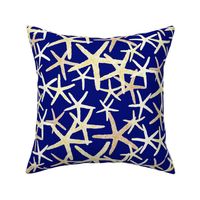 Starfish in White & Yellow Tones on Dark Blue