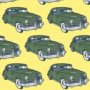 green 1946 Packard on yellow background