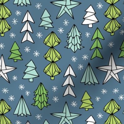 Christmas trees and origami decoration stars seasonal geometric december holiday design green blue night