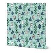 Christmas trees and origami decoration stars seasonal geometric december holiday design mint blue